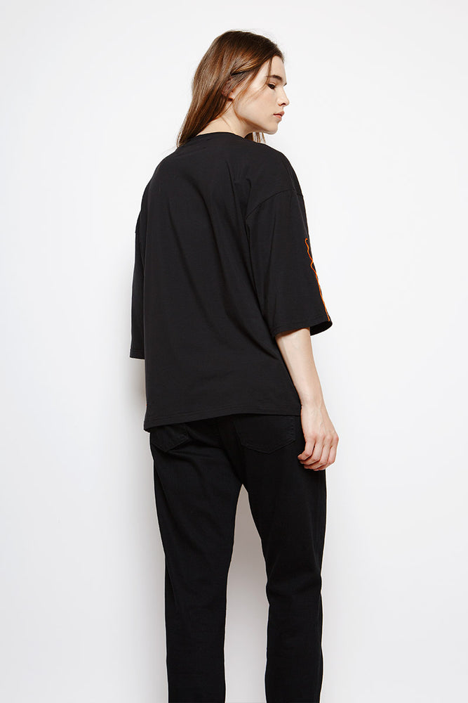 Muzca Slogan Tees In Supima Modest Loose Fitting Black T-Shirt with Oversized Fit and Orange Text