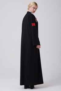 FERADJE black modest abaya with embroidery patches of numbers like a basketball jacket made from crepe side view