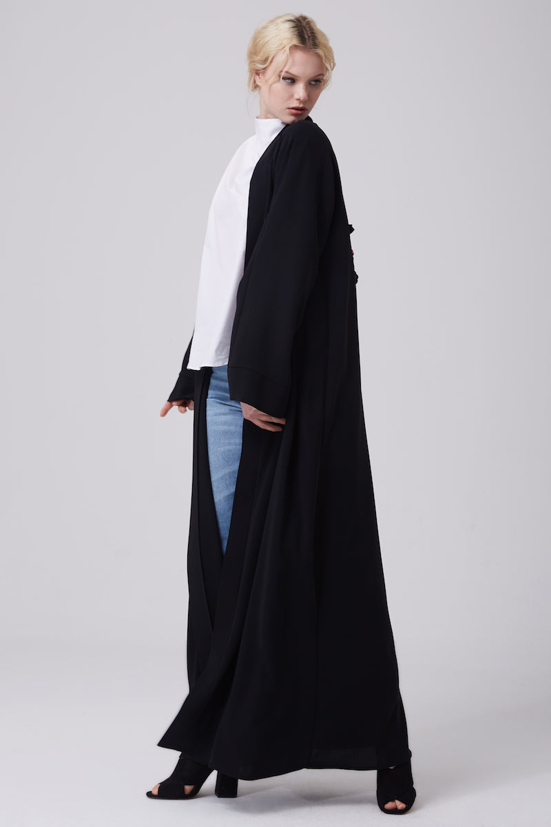 FERADJE modest black abaya or kimono with a flowery embroidery made from the finest crepe side view