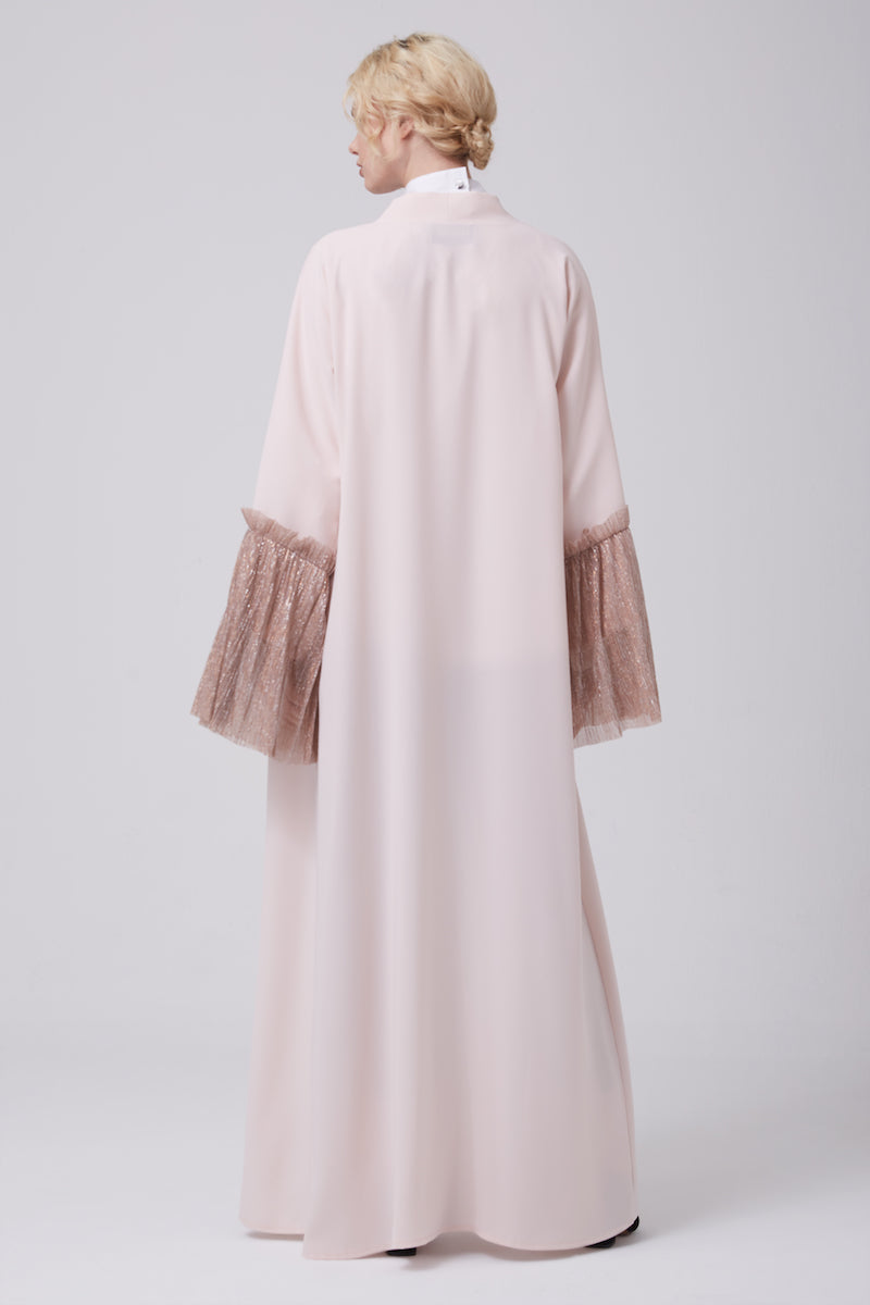 FERADJE open-front abaya with bell sleeves on Silver and Pink its made from crepe and crimped silvery fabric at the cuffs back view