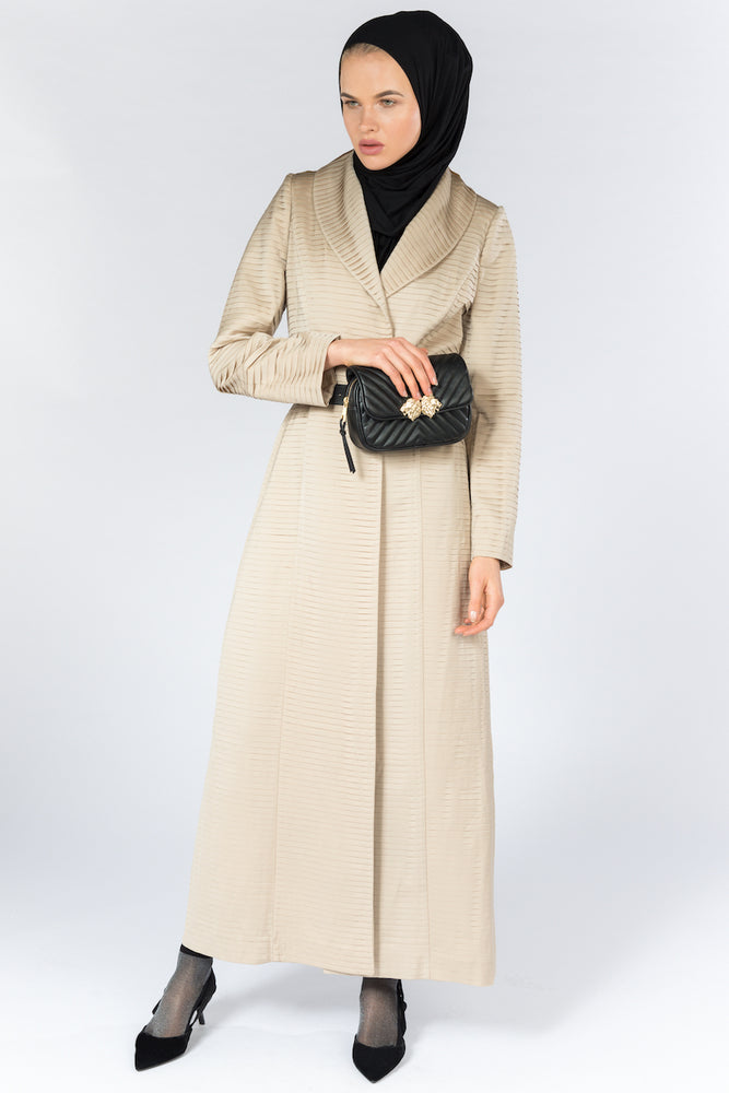 FERADJE Modest Women Royal Abaya in golden beige with collar and elegant pleated abraham fabric. It is unbuttoned and has fitted straight arms. It is design as a coat so it's perfect for any occasion and season. It can be machine washed side view 