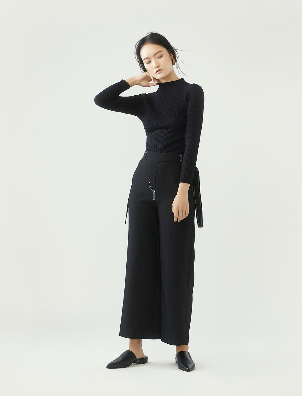 r y e  Modest Women Ribbed Knit Long Sleeve Top in Black with ribbed details and high neck collar made from 95% Viscose and 5% Spandex full length view