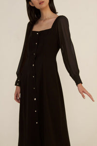 módni Alcea Puff Long Sleeve Dress in Black Modest Sheer Midi Dress With Silver Buttons in Cotton and Polyester